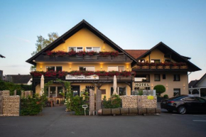 Гостиница Hotel Garni Zum Grünen Baum  Хёфельхоф